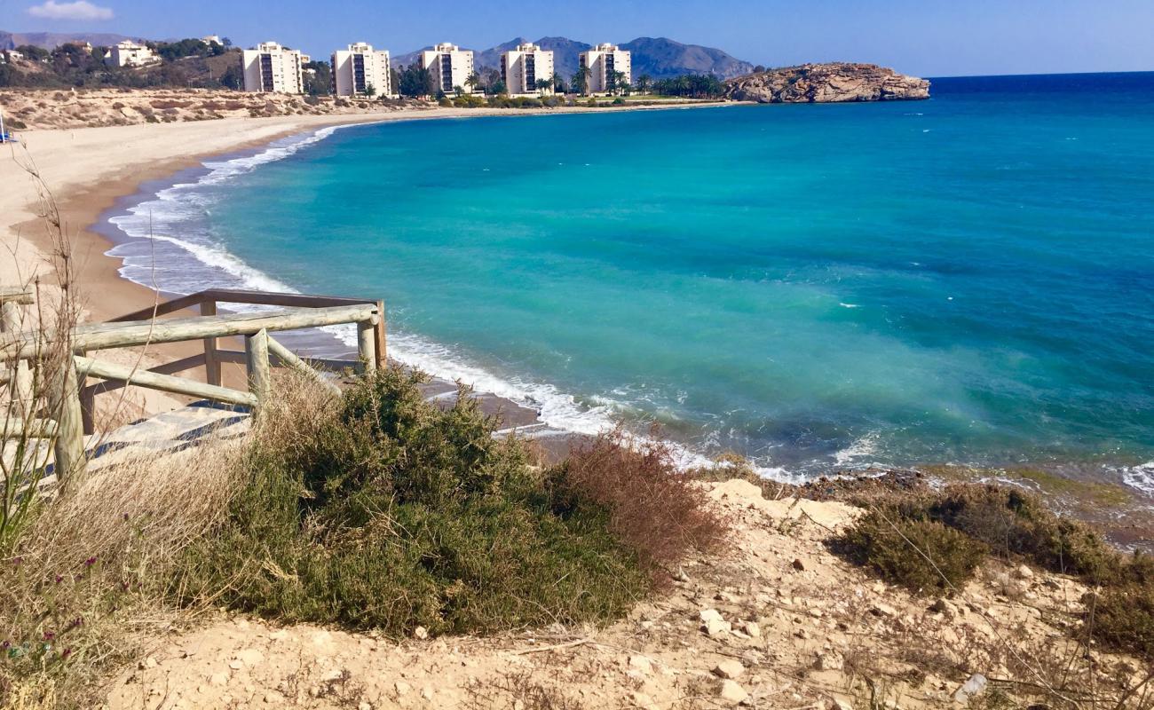 Foto af Playa de el Mojon med sort sand og småsten overflade