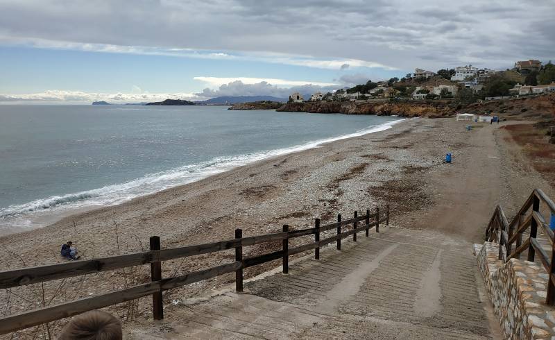 Foto af Playa del Corral med sort sand og småsten overflade