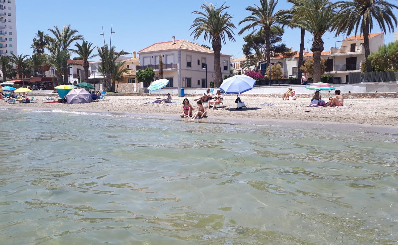 Foto af Playa de Colon med grå sand overflade