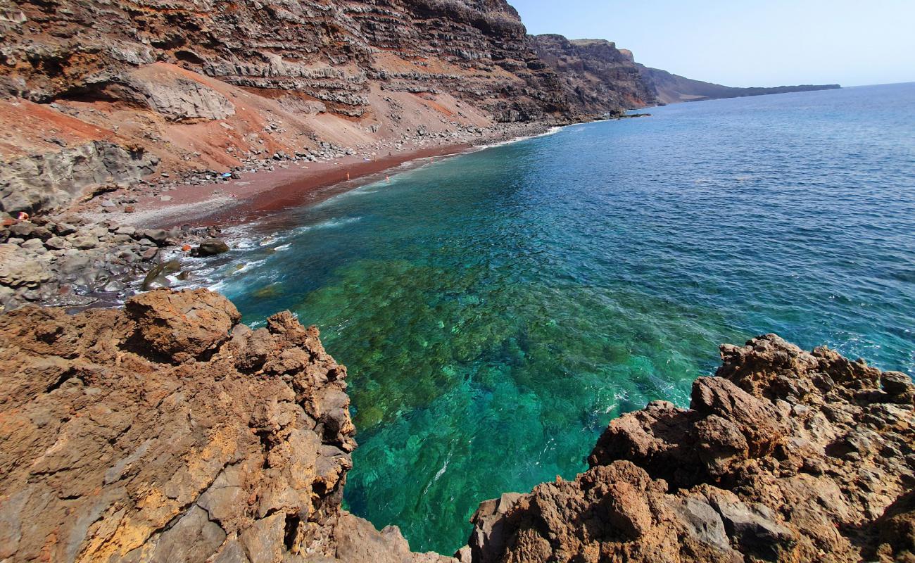 Foto af Playa del Verodal med lyserødt sand overflade