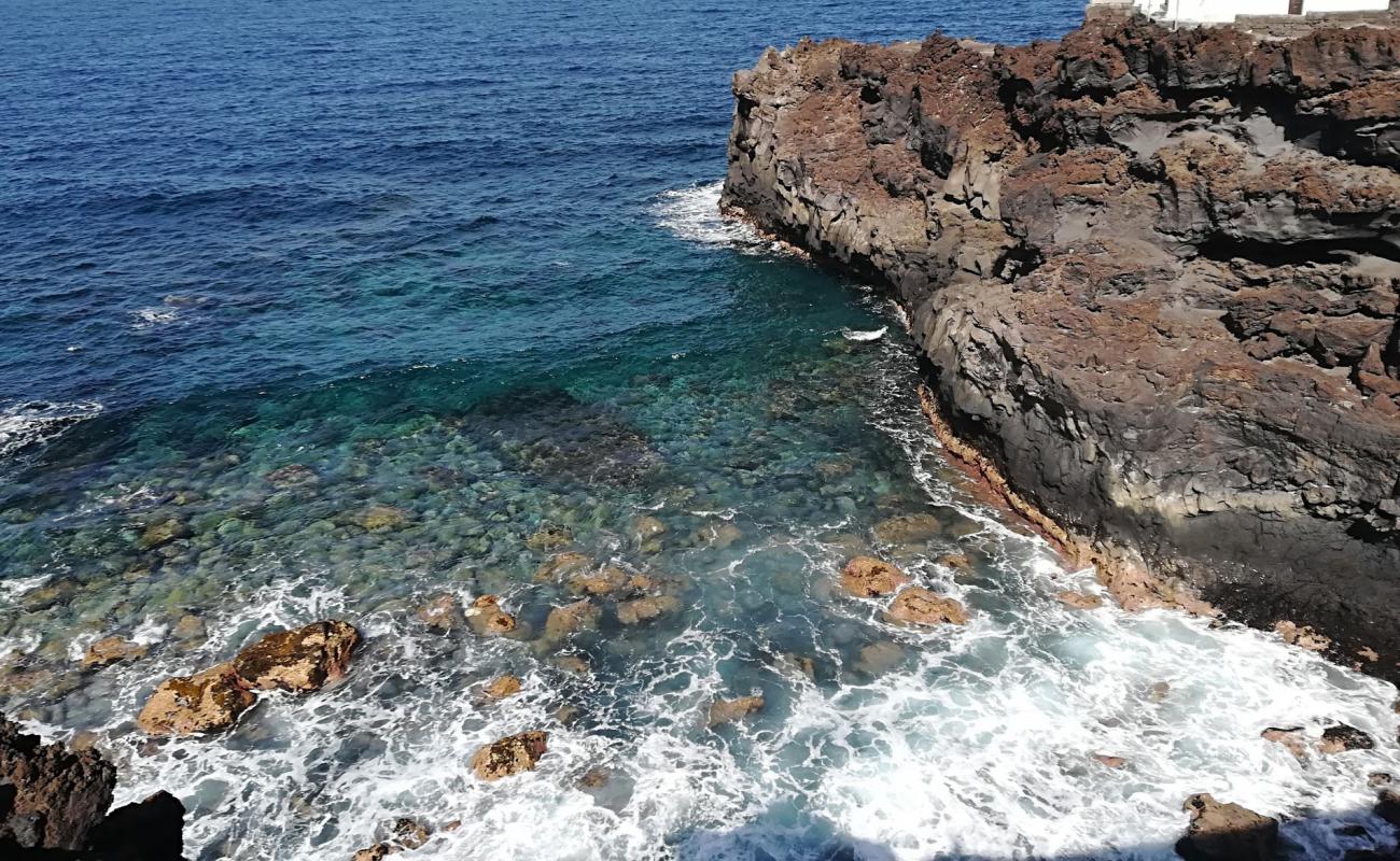 Foto af Playa de los Palos med sten overflade