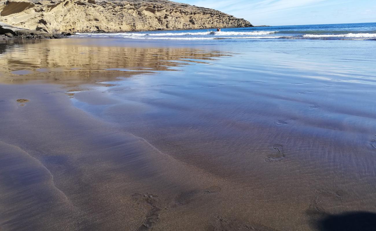 Foto af Playa La Pelada med brunt sand overflade