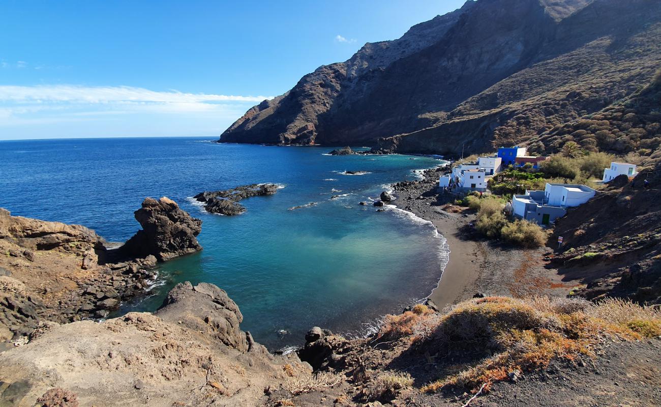 Foto af Playa Casas Blancas med grå sand overflade