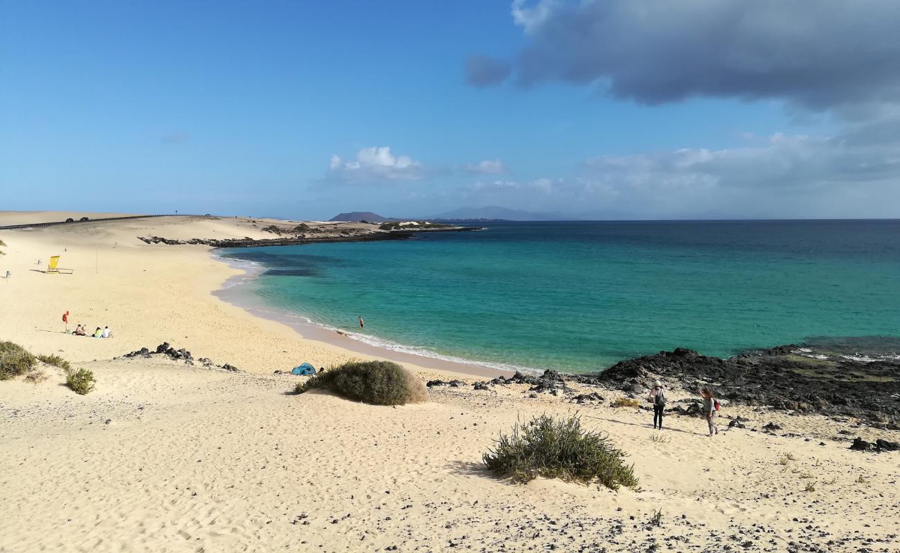 Foto af Alzada Strand med lys fint sand overflade