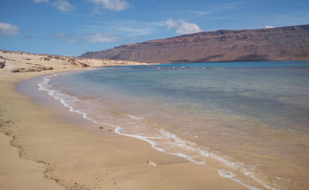 Foto af Playa del Salado med let sand og småsten overflade