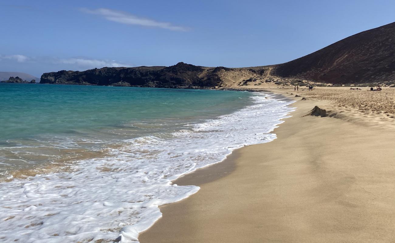 Foto af Playa de las Conchas med lys fint sand overflade