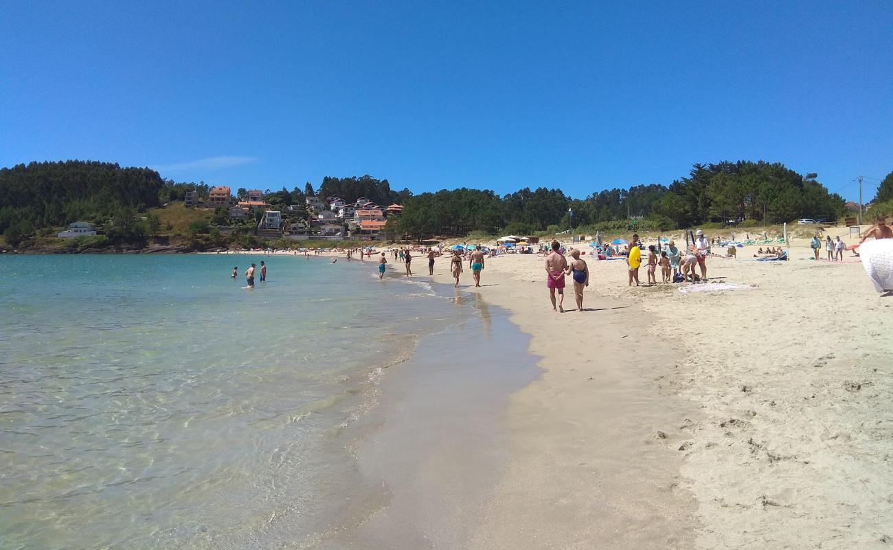 Foto af Canelas beach med hvidt fint sand overflade