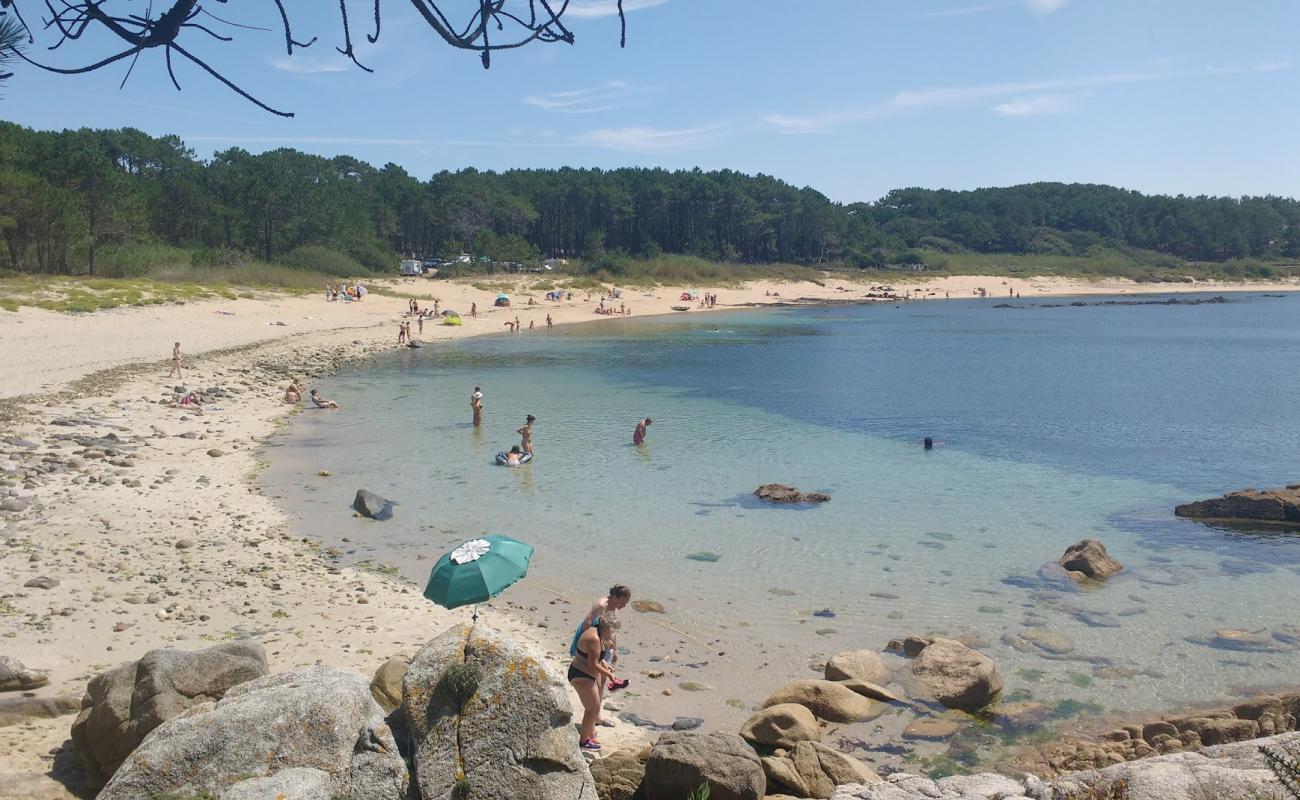 Foto af Canelas beach med lys sand overflade