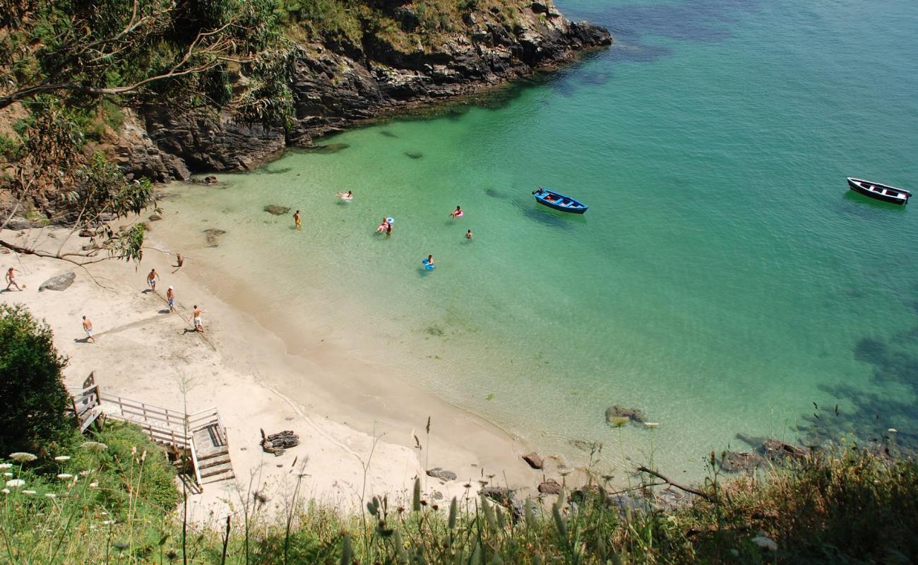 Foto af Cala Sonreiras med hvidt sand overflade