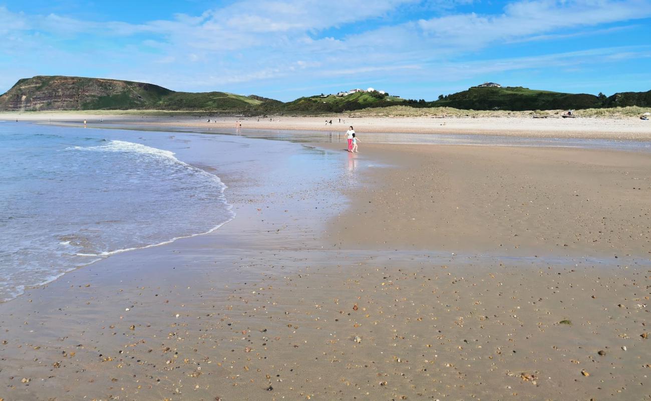 Foto af Xago Strand med lys sand overflade