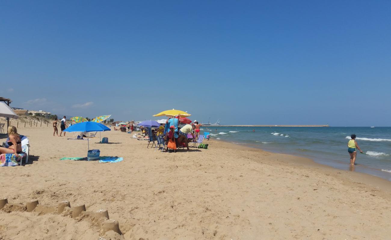 Foto af Daimus Strand med lys sand overflade