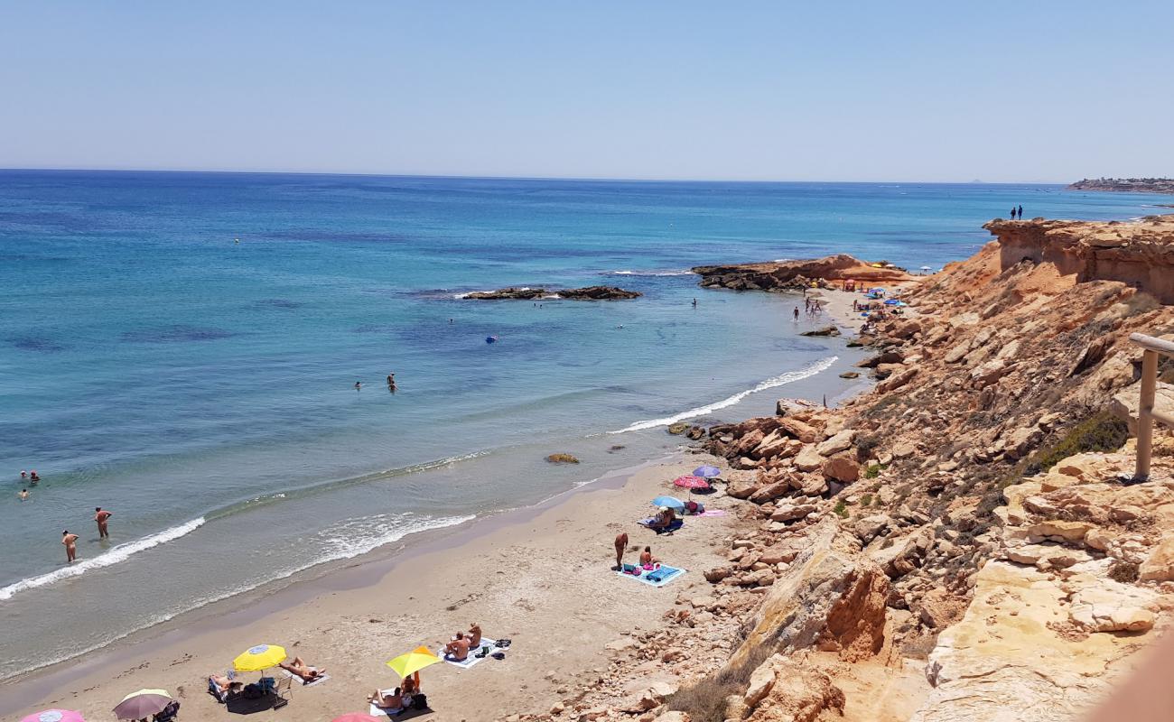 Foto af Cala La Mosca med lys sand overflade