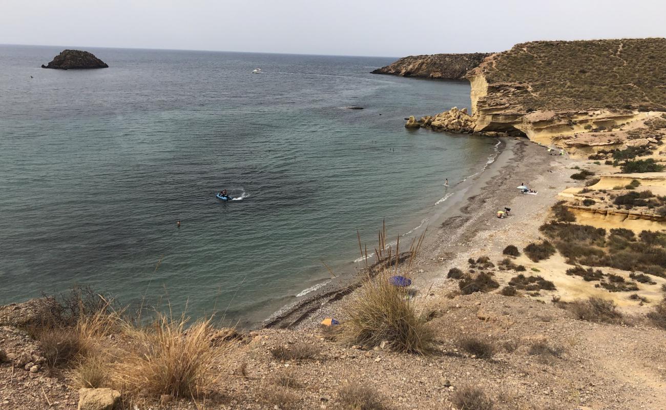 Foto af Playa de Piedra Mala med gråt sand og småsten overflade