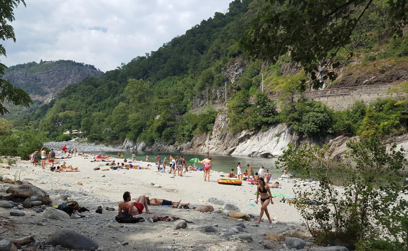 Foto af Spiaggia del Meriggio el Merisg med gråt sand og sten overflade