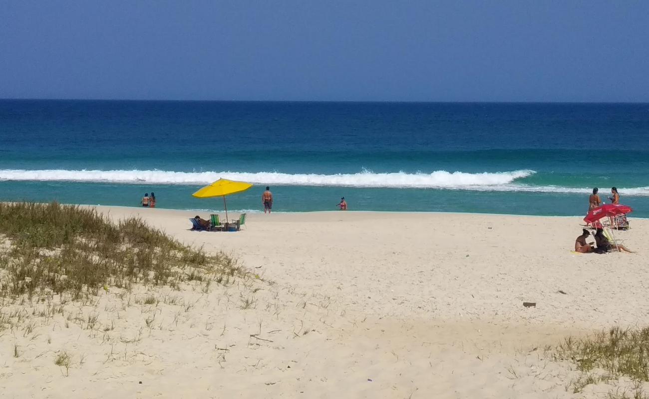 Foto af Praia do Dentinho med hvidt fint sand overflade