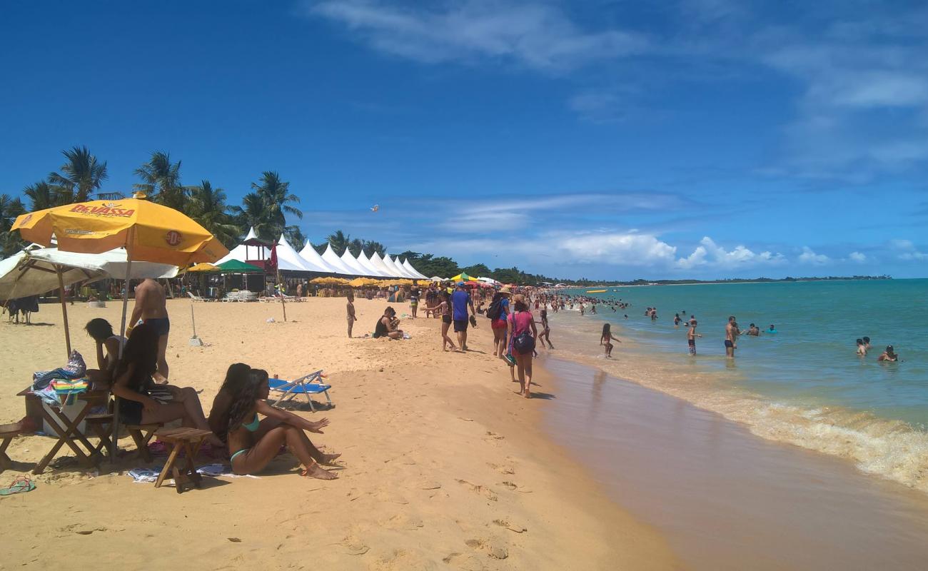 Foto af Taperapua Strand med lys fint sand overflade