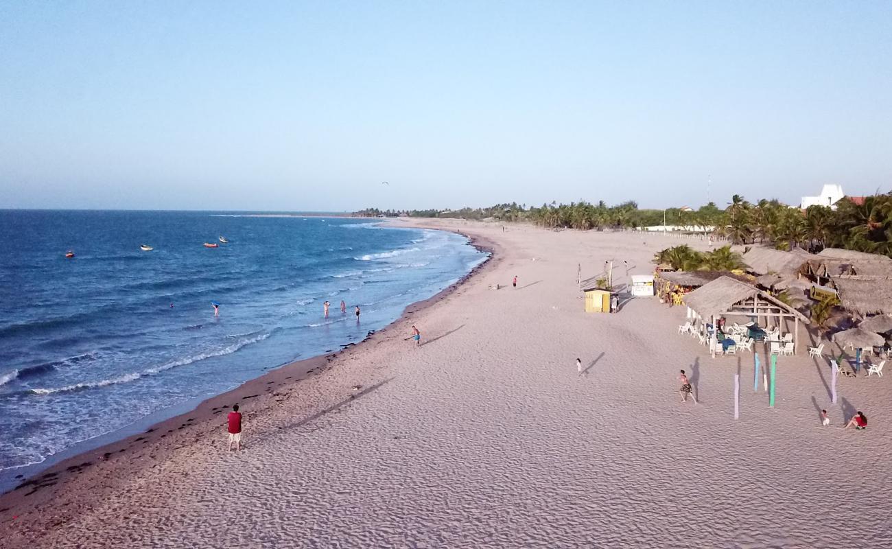 Foto af Praia do Coqueiro med lys sand overflade