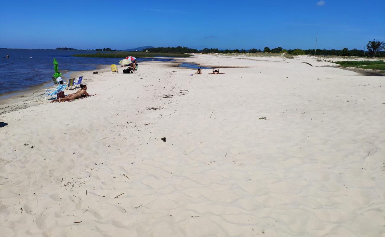 Foto af Varzinha Beach med lys sand overflade