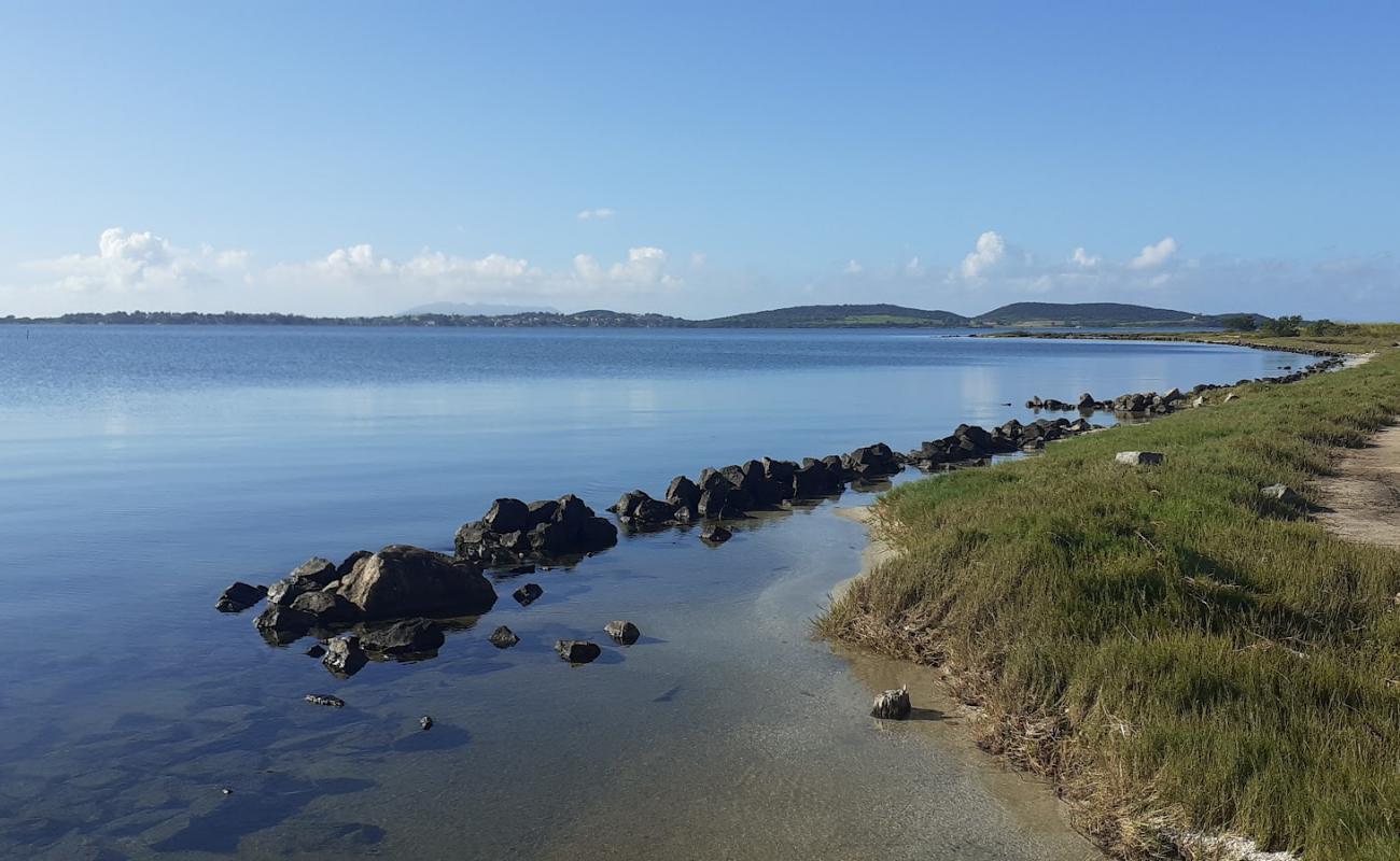 Foto af Praia Ponta DAgua med lyst sand & sten overflade