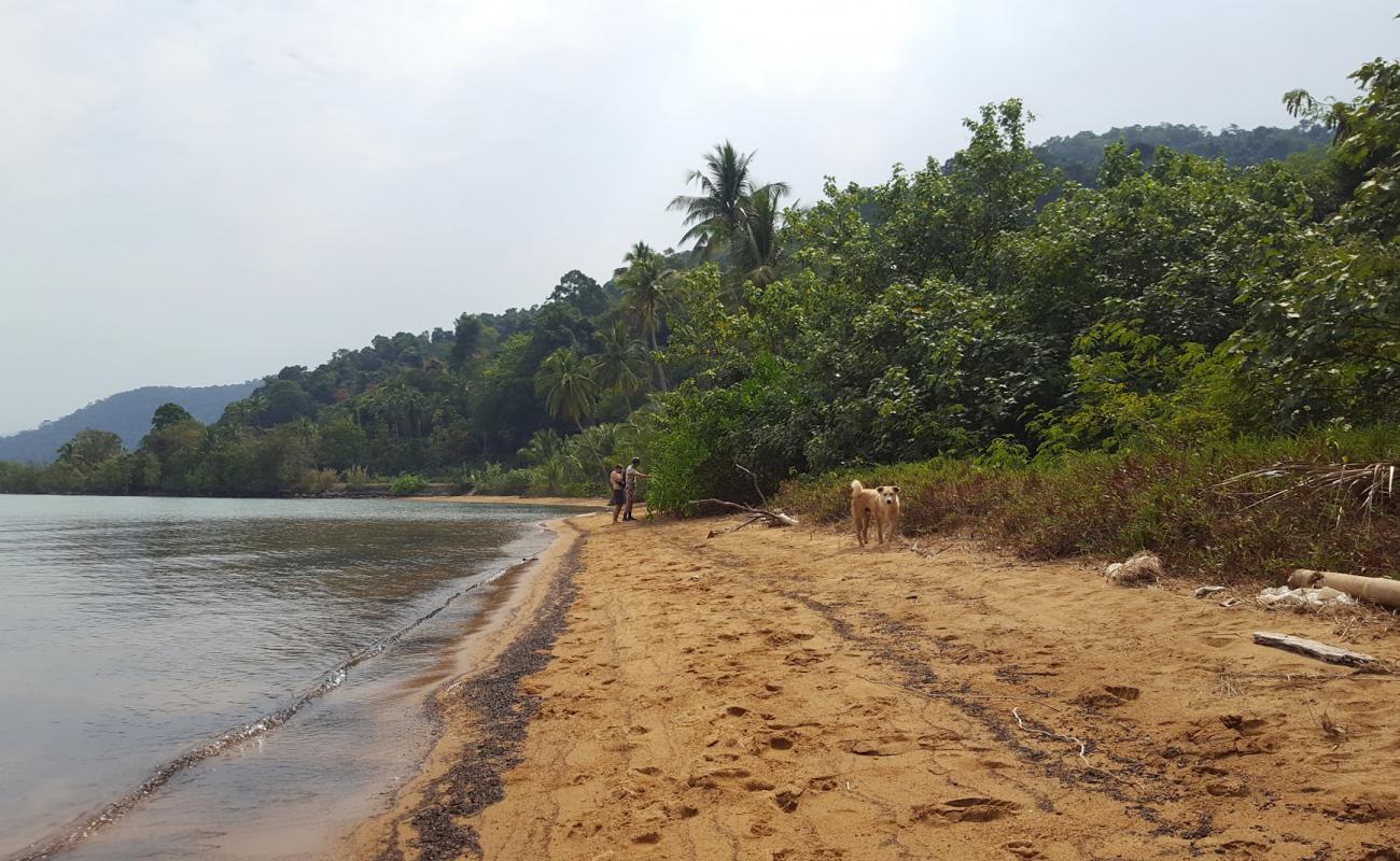 Foto af Exotic Beach med brunt sand overflade