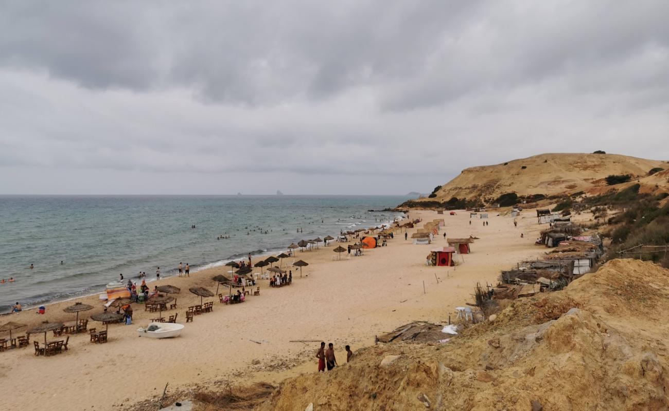 Foto af Louka's Beach med fin brunt sand overflade