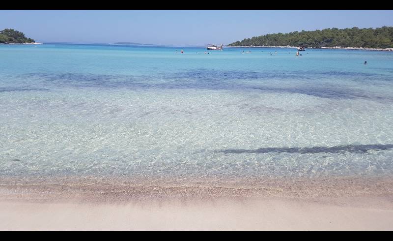 Foto af Haydar Bay med lys sand overflade