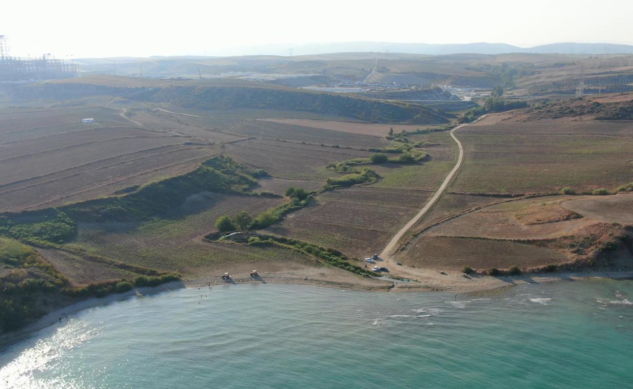 Foto af Gulluk Sahili med let sand og småsten overflade