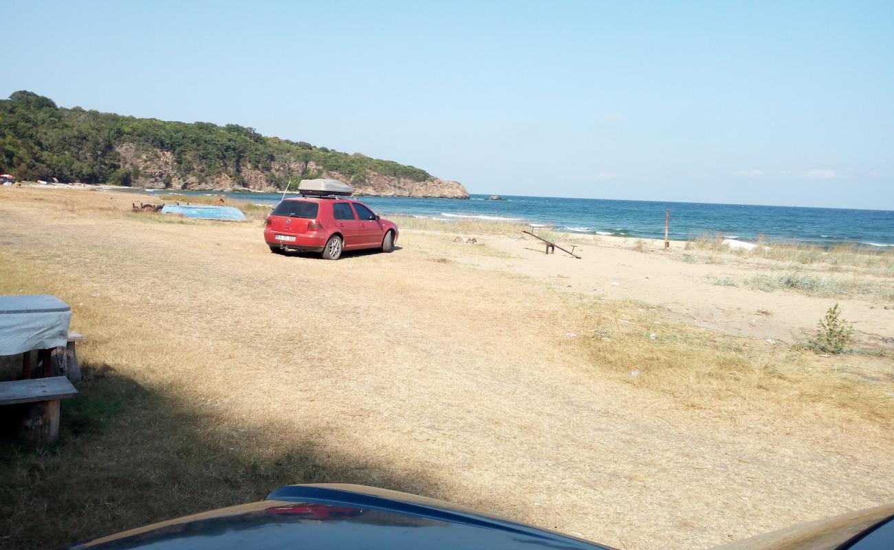 Foto af Police beach med lys sand overflade