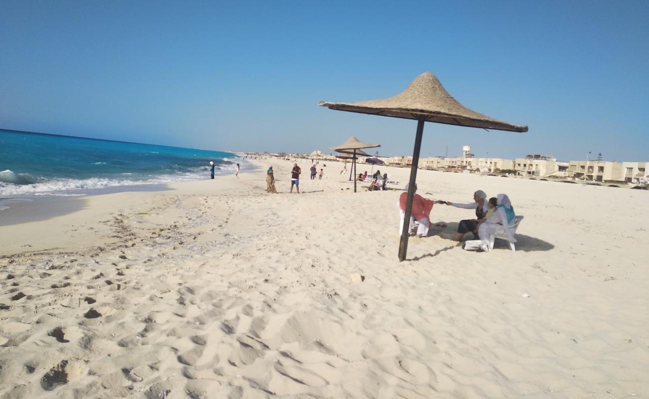 Foto af Zomoroda Beach med hvidt fint sand overflade