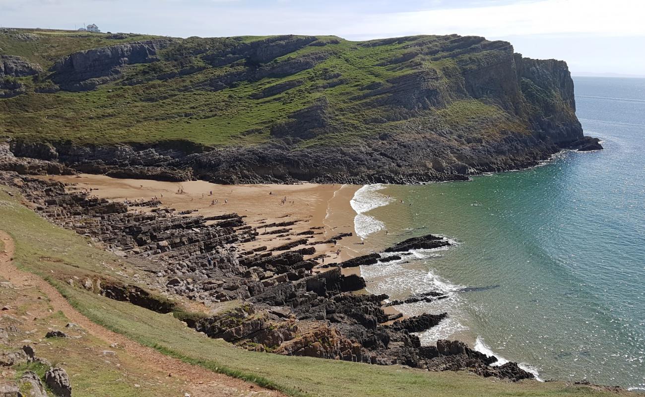 Foto af Mewslade Bay med grå sand overflade