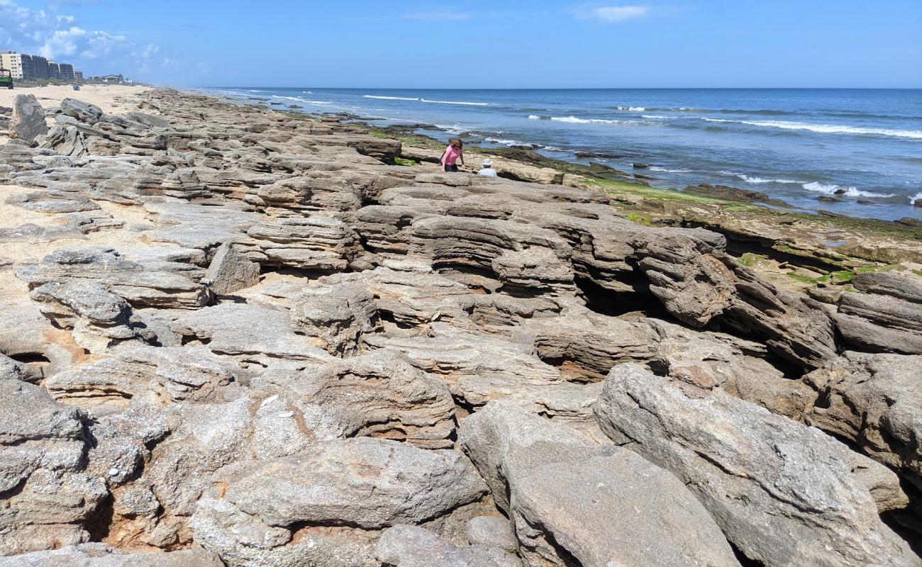 Foto af Flagler beach med lyst sand & sten overflade