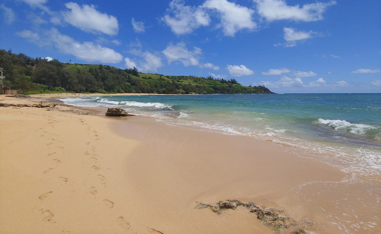 Foto af Moloa'a Beach med lys sand overflade