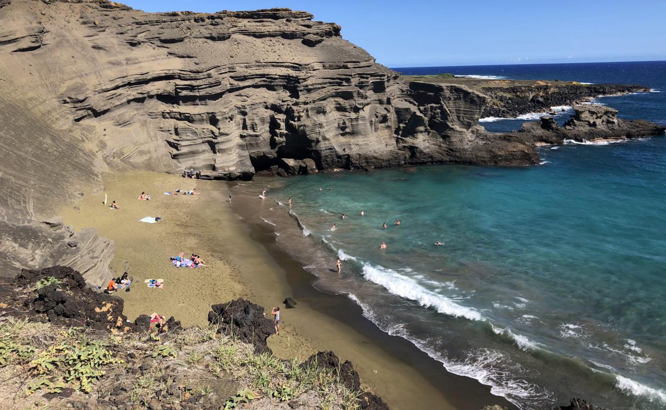 Foto af Grøn sandStrand med lys sand overflade