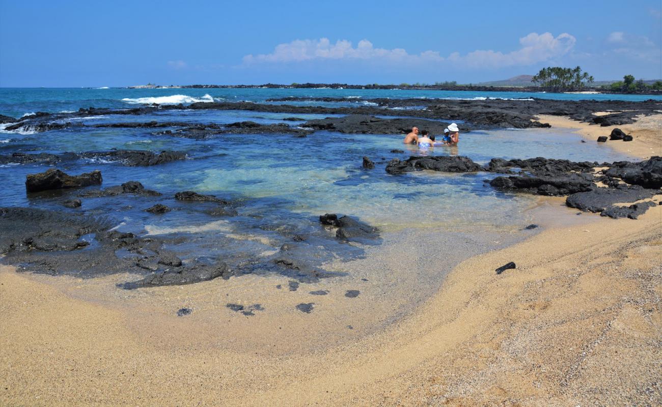 Foto af O'oma Beach med lyst sand & sten overflade