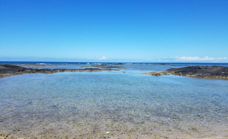 Foto af Mauna Lani Beach med lys sand overflade