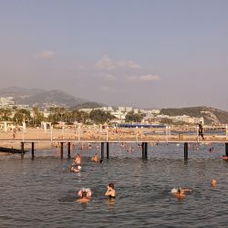 Foto af Turkler beach IV med grønt vand overflade